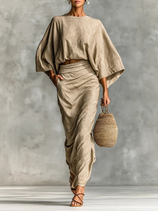 Set di Due Pezzi Beige con Top a Manica A Pipistrello e Gonna Lunga per un'Eleganza Senza Sforzo